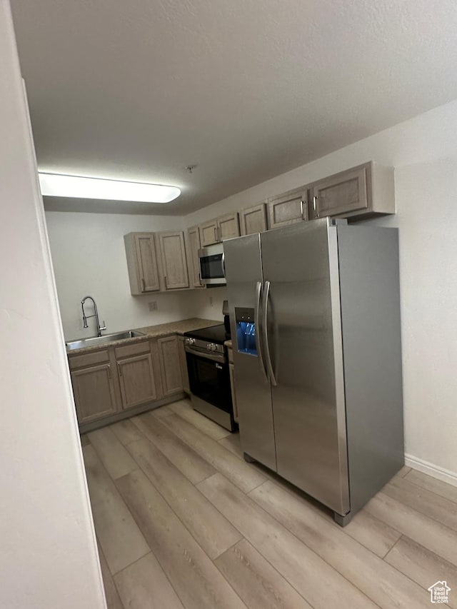 59 W Ridge Rd N, Saratoga Springs, UT 84043 - kitchen featuring appliances with stainless steel finishes and light wood-type flooring