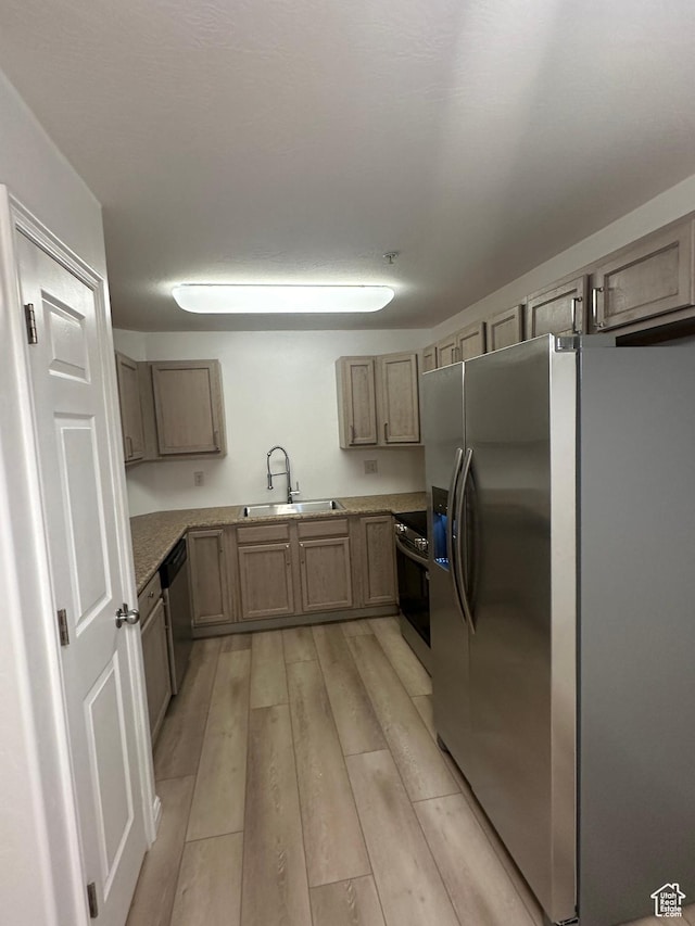 59 W Ridge Rd N, Saratoga Springs, UT 84043 - kitchen with stainless steel appliances and light wood finished floors