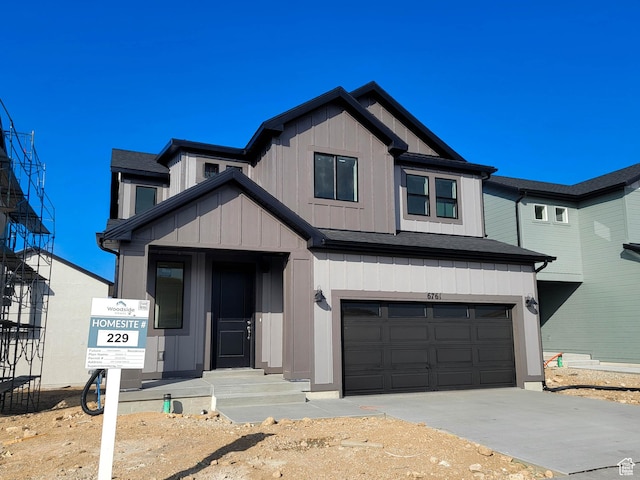 6761 S Glade Creek Dr Unit 229, West Jordan, UT 84081 - view of front facade with an attached garage and concrete driveway