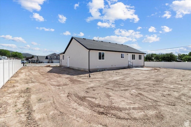 61 E 600 S, Nephi, UT 84648 - rear view of house with a fenced backyard