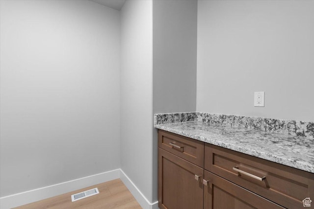 61 E 600 S, Nephi, UT 84648 - laundry room with light wood-type flooring and baseboards