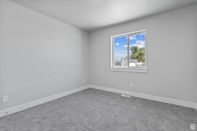 61 E 600 S, Nephi, UT 84648 - unfurnished room featuring carpet and a textured ceiling