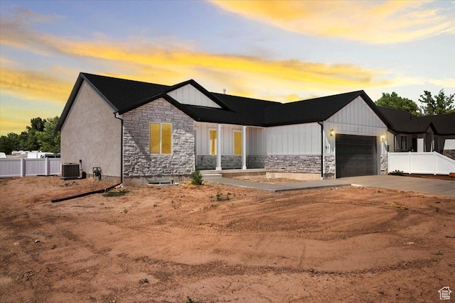 61 E 600 S, Nephi, UT 84648 - modern farmhouse with stone siding, driveway, an attached garage, and board and batten siding