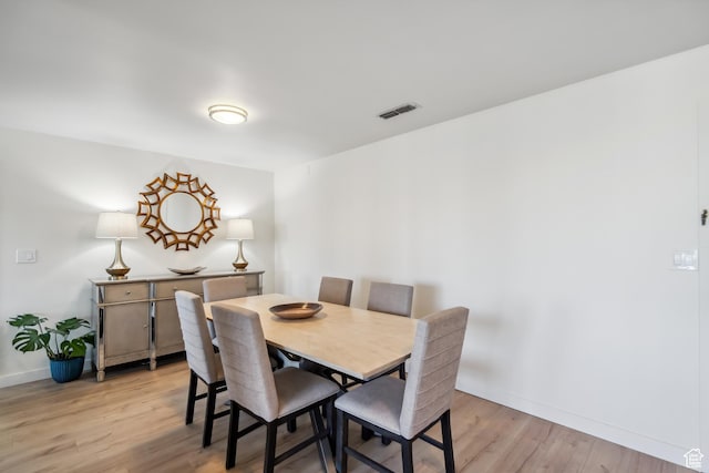 777 E S Temple N Unit 4B, Salt Lake City, UT 84102 - dining area featuring light wood finished floors and baseboards