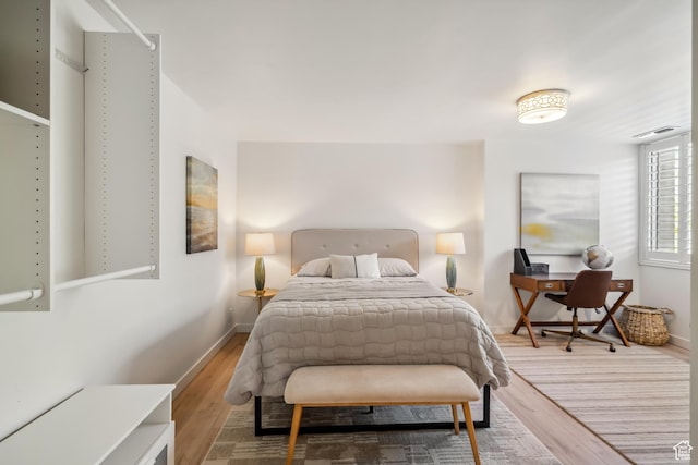 777 E S Temple N Unit 4B, Salt Lake City, UT 84102 - bedroom with wood finished floors and a desk