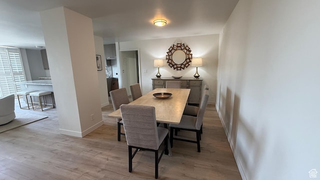 777 E S Temple N Unit 4B, Salt Lake City, UT 84102 - dining space with light wood finished floors and baseboards