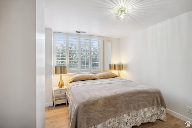 777 E S Temple N Unit 4B, Salt Lake City, UT 84102 - bedroom with light wood finished floors and baseboards