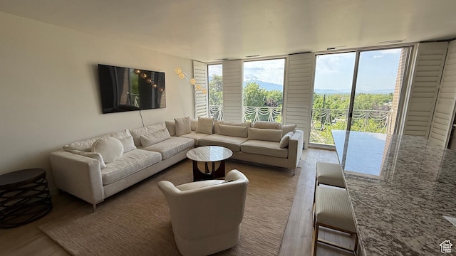 777 E S Temple N Unit 4B, Salt Lake City, UT 84102 - living area with wood finished floors and floor to ceiling windows