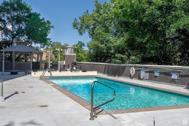 777 E S Temple N Unit 4B, Salt Lake City, UT 84102 - view of swimming pool featuring a gazebo and a patio