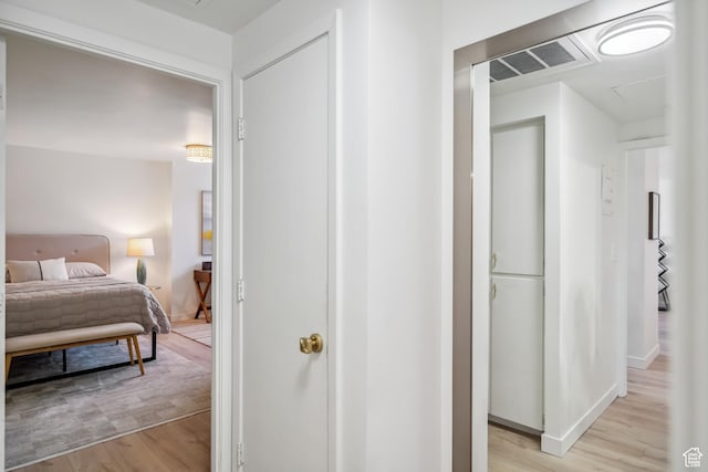 777 E S Temple N Unit 4B, Salt Lake City, UT 84102 - hallway featuring light wood finished floors