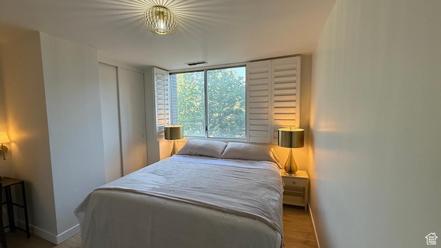 777 E S Temple N Unit 4B, Salt Lake City, UT 84102 - bedroom featuring wood finished floors and a closet