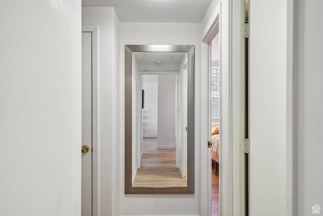 777 E S Temple N Unit 4B, Salt Lake City, UT 84102 - hallway with attic access and wood finished floors