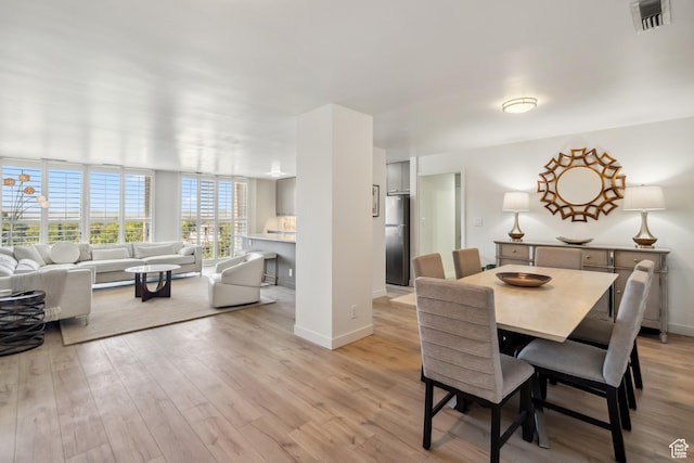 777 E S Temple N Unit 4B, Salt Lake City, UT 84102 - dining space with light wood finished floors and baseboards