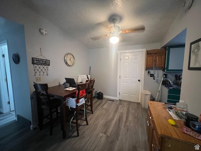 675 W 2550 S, Price, UT 84501 - dining room featuring dark wood-style flooring, a desk, a textured ceiling, and ceiling fan