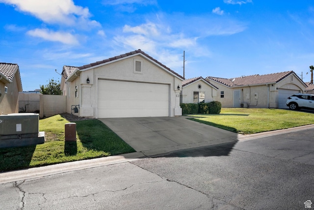 470 E 1100 S Unit 63, St George, UT 84790 - view of front of home featuring concrete driveway, a garage, stucco siding, and a tile roof