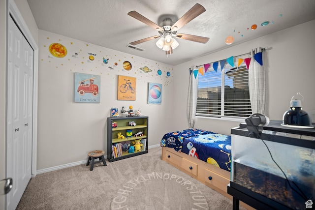 470 E 1100 S Unit 63, St George, UT 84790 - bedroom with carpet, a closet, ceiling fan, and a textured ceiling