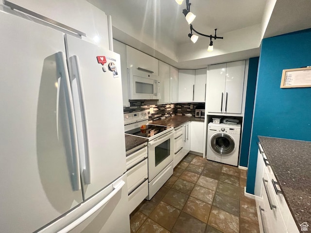 110 S 800 E Unit 300, Salt Lake City, UT 84102 - kitchen featuring white appliances, washer / dryer, white cabinets, tasteful backsplash, and stone finish flooring