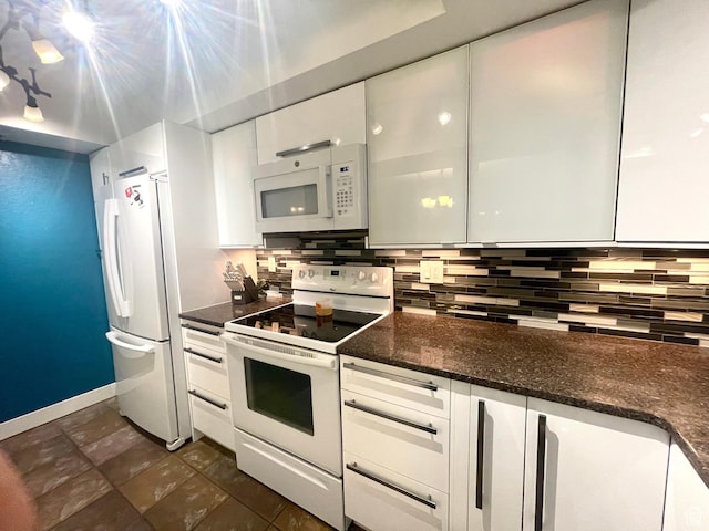 110 S 800 E Unit 300, Salt Lake City, UT 84102 - kitchen with white appliances, white cabinets, decorative backsplash, and modern cabinets