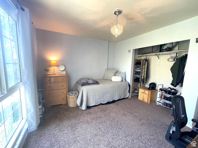 110 S 800 E Unit 300, Salt Lake City, UT 84102 - carpeted bedroom with a chandelier and a closet