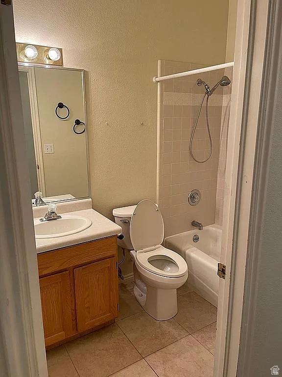 1118 E Chokeberry Dr, St George, UT 84790 - full bath with tile patterned floors, vanity, tub / shower combination, and a textured wall