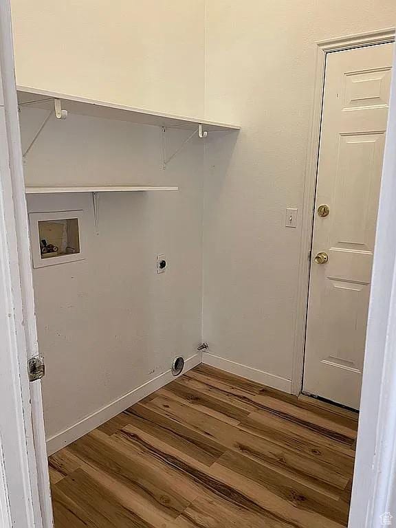 1118 E Chokeberry Dr, St George, UT 84790 - laundry room with hookup for a washing machine, wood finished floors, and electric dryer hookup