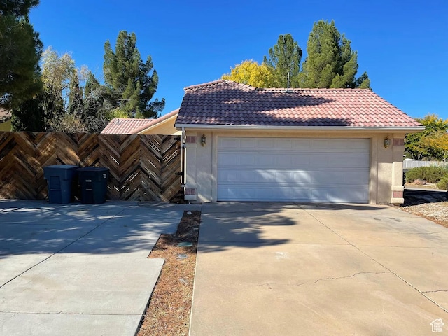 1118 E Chokeberry Dr, St George, UT 84790 - view of front of property with a tile roof and stucco siding
