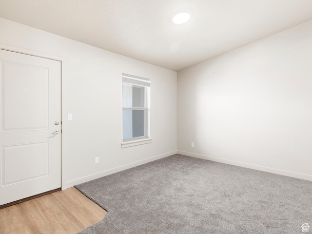 1140 W 950 N Unit C403, Orem, UT 84057 - spare room with baseboards and light carpet