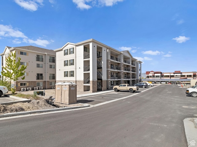 1140 W 950 N Unit C403, Orem, UT 84057 - view of apartment building / complex featuring uncovered parking
