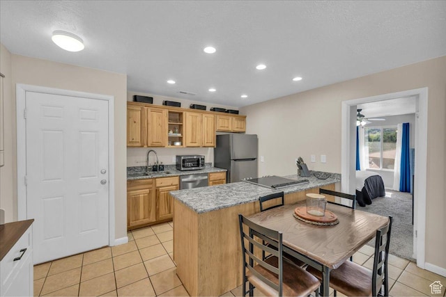 695 N 500 W # 5, St George, UT 84770 - kitchen featuring appliances with stainless steel finishes, light tile patterned floors, ceiling fan, recessed lighting, and open shelves
