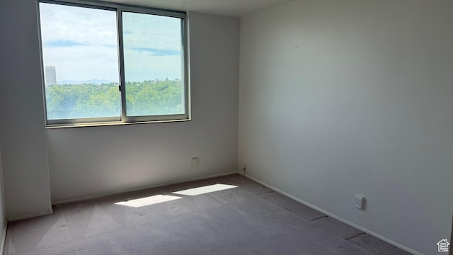 777 E S Temple N Unit 9J, Salt Lake City, UT 84102 - carpeted empty room with plenty of natural light
