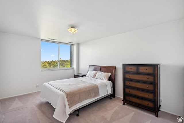 777 E S Temple N Unit 9J, Salt Lake City, UT 84102 - bedroom featuring light carpet