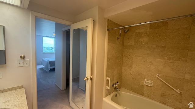777 E S Temple N Unit 9J, Salt Lake City, UT 84102 - full bath with washtub / shower combination, vanity, and ensuite bathroom