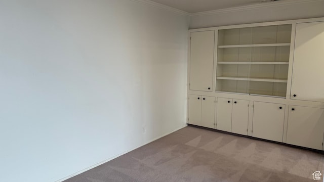 777 E S Temple N Unit 9J, Salt Lake City, UT 84102 - unfurnished room featuring light carpet and crown molding