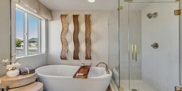 2158 W 2615 N Unit 137, Clinton, UT 84015 - bathroom with plenty of natural light, a shower stall, and a soaking tub