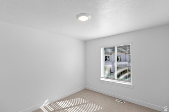 511 S 1225 W Unit 102, Logan, UT 84321 - empty room featuring light carpet and baseboards