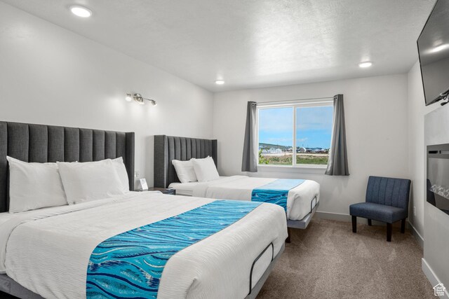 140 W 150 S Unit I34, Garden City, UT 84028 - bedroom with carpet floors and recessed lighting