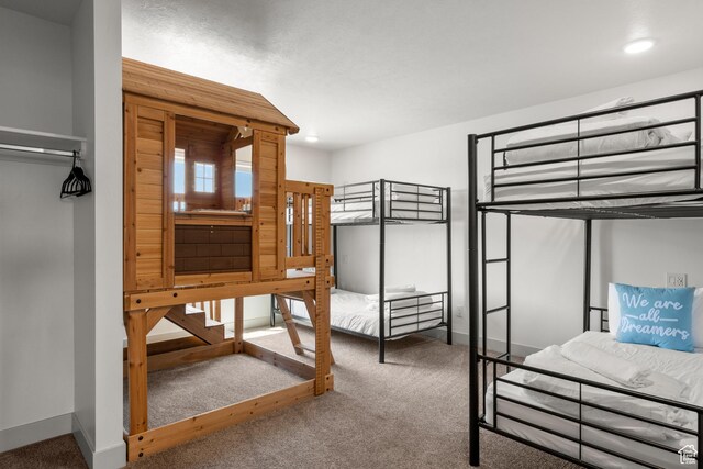 140 W 150 S Unit I34, Garden City, UT 84028 - unfurnished bedroom with carpet floors and recessed lighting