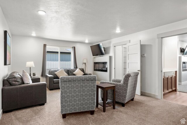 140 W 150 S Unit I34, Garden City, UT 84028 - living room featuring carpet flooring and recessed lighting