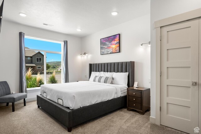 140 W 150 S Unit I34, Garden City, UT 84028 - bedroom featuring light colored carpet and recessed lighting