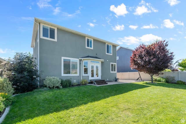 68 N Eden Way, Vineyard, UT 84059 - rear view of house featuring french doors, a patio, and stucco siding