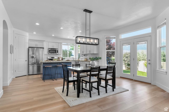 68 N Eden Way, Vineyard, UT 84059 - dining room with recessed lighting, light wood-style floors, and arched walkways