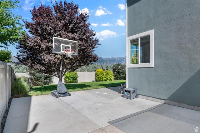 68 N Eden Way, Vineyard, UT 84059 - fenced backyard featuring a mountain view and a patio