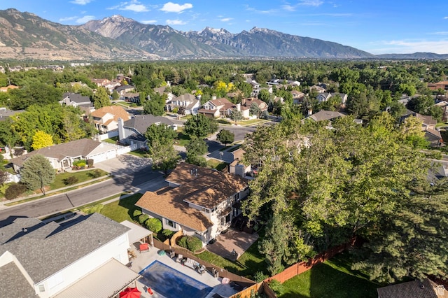 4630 S Stockbridge Ln, Millcreek, UT 84117 - aerial view of residential area featuring a mountain backdrop