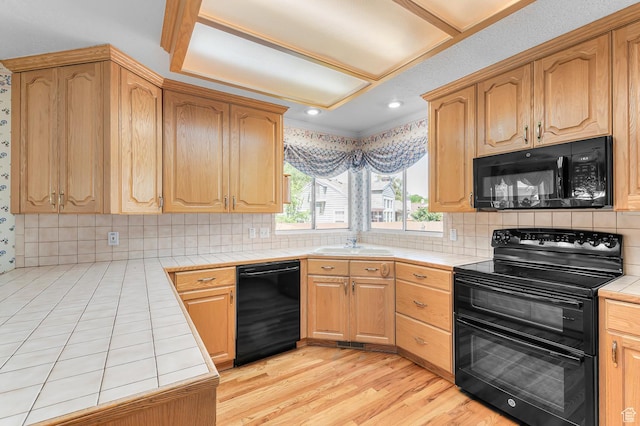 4630 S Stockbridge Ln, Millcreek, UT 84117 - kitchen featuring black appliances, tile counters, backsplash, and recessed lighting