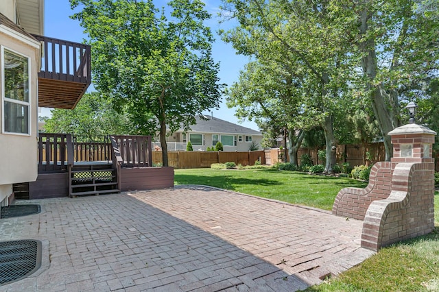 4630 S Stockbridge Ln, Millcreek, UT 84117 - fenced backyard with a patio and a deck