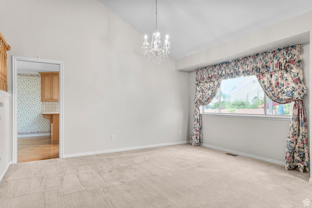 4630 S Stockbridge Ln, Millcreek, UT 84117 - carpeted spare room with a chandelier and high vaulted ceiling