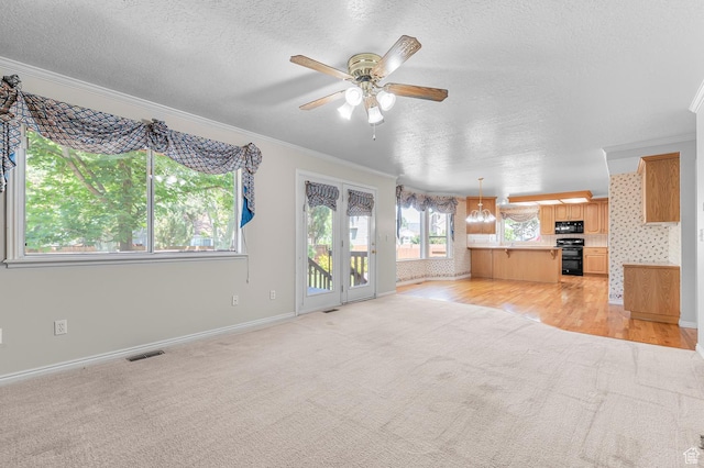 4630 S Stockbridge Ln, Millcreek, UT 84117 - unfurnished living room featuring crown molding, light carpet, a ceiling fan, and a textured ceiling
