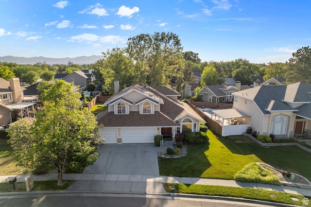 4630 S Stockbridge Ln, Millcreek, UT 84117 - aerial perspective of suburban area with a mountainous background