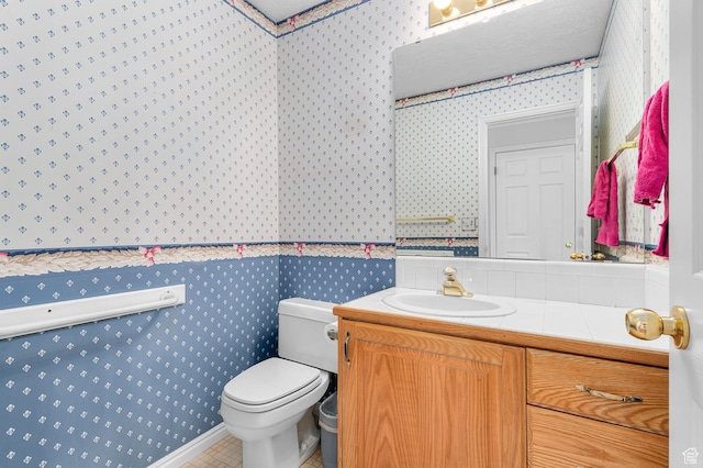 4630 S Stockbridge Ln, Millcreek, UT 84117 - half bath with wallpapered walls and vanity