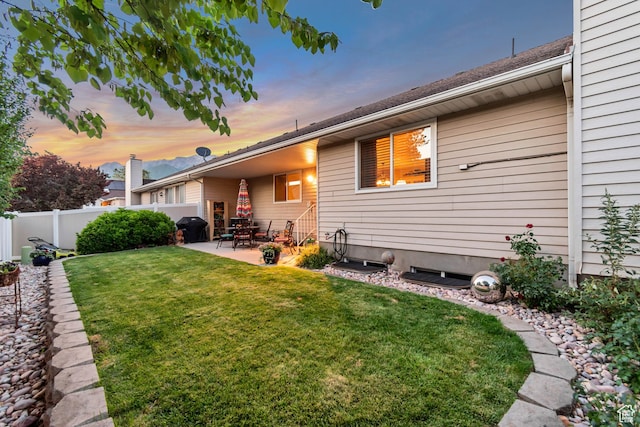 145 N 240 E, Orem, UT 84057 - back of house at dusk with a patio